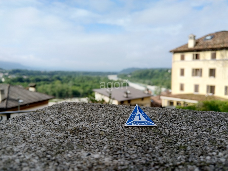 The hard-earned lapel pin of Alta Via 1 in Belluno